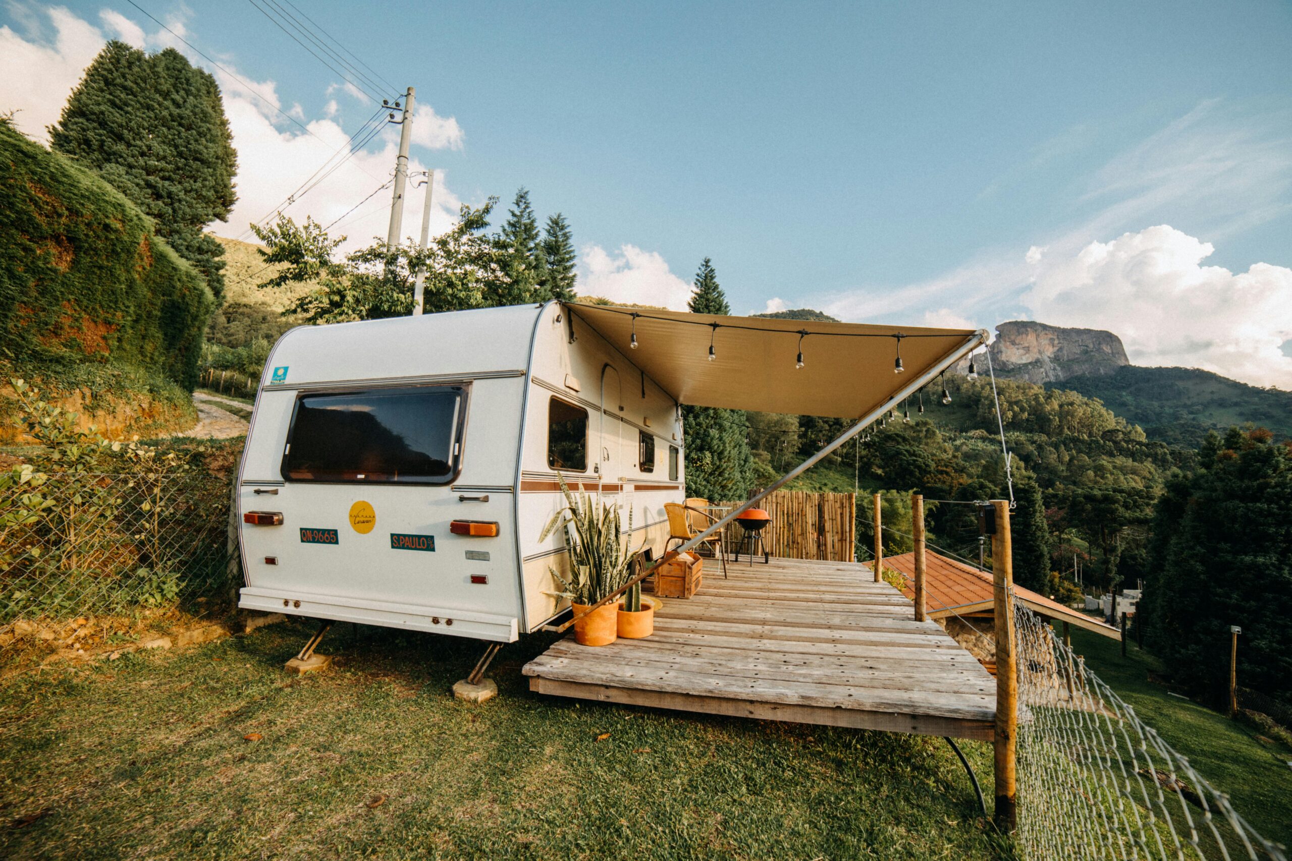 TrailBound Mobile RV Service reliable service with cosmetics and structure with tranquil outdoor campsite with caravan deck and picturesque and comfortable setup